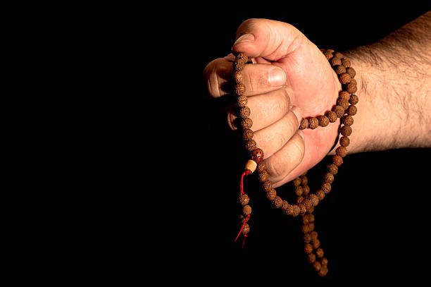 A Japa mala or mala is a string of prayer beads commonly used by Hindus, Buddhists and some Sikhs for the spiritual practice known in Sanskrit as japa. It is usually made from 108 beads, though other numbers are also used. Malas are used for keeping count while reciting, chanting, or mentally repeating a mantra or the name or names of a deity.